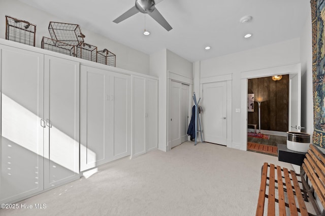 183 W Main St Unit 205, Washington, NC 27889 - carpeted bedroom featuring recessed lighting, a ceiling fan, and multiple closets