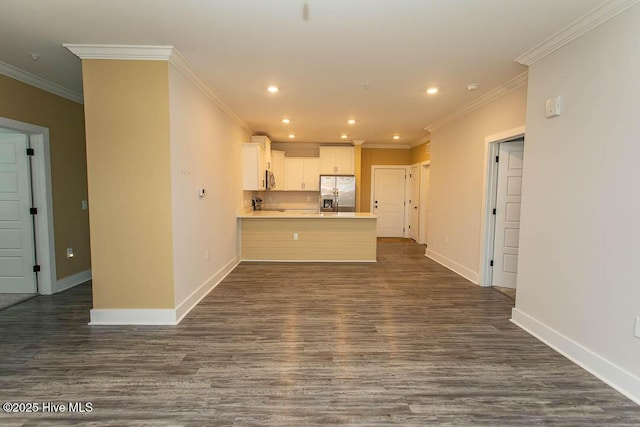 395 S Crow Creek Dr NW Unit 1615, Calabash, NC 28467 - kitchen featuring appliances with stainless steel finishes, dark wood-style floors, baseboards, a peninsula, and recessed lighting