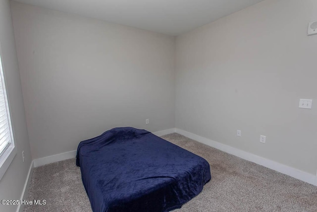 395 S Crow Creek Dr NW Unit 1615, Calabash, NC 28467 - carpeted bedroom featuring baseboards