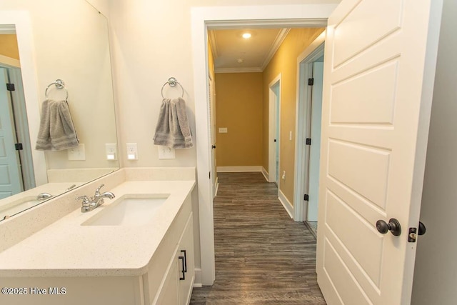 395 S Crow Creek Dr NW Unit 1615, Calabash, NC 28467 - bathroom featuring crown molding, wood finished floors, vanity, and baseboards