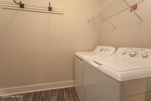 395 S Crow Creek Dr NW Unit 1615, Calabash, NC 28467 - laundry room featuring washing machine and dryer, dark wood finished floors, and baseboards