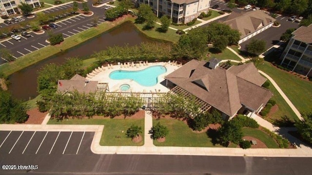 395 S Crow Creek Dr NW Unit 1615, Calabash, NC 28467 - bird's eye view of a pool area and a nearby body of water