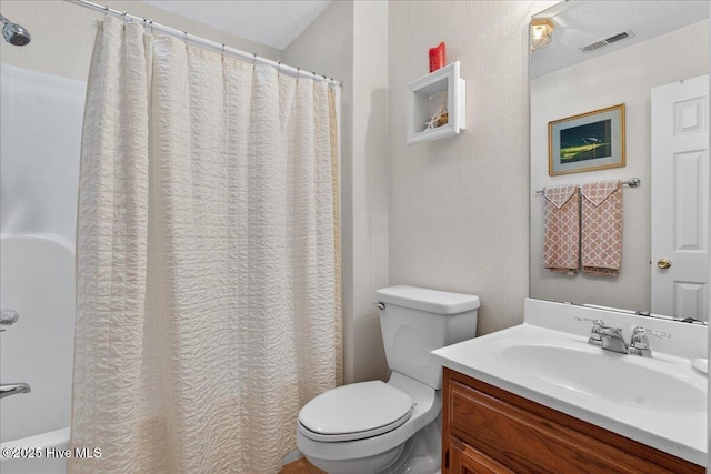 354 Sea Trail Dr E Unit 2, Sunset Beach, NC 28468 - full bathroom featuring toilet, vanity, and a shower with shower curtain