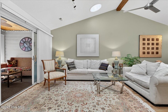 354 Sea Trail Dr E Unit 2, Sunset Beach, NC 28468 - living area with ceiling fan, wood finished floors, beam ceiling, and high vaulted ceiling