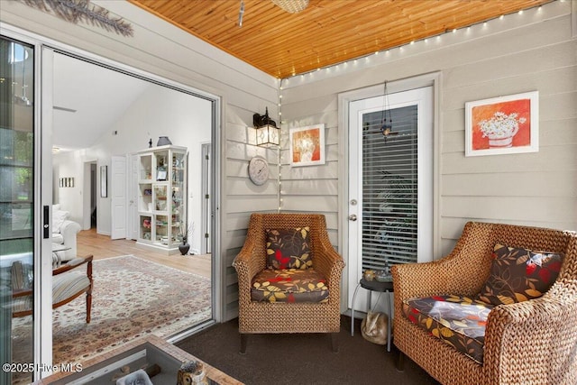 354 Sea Trail Dr E Unit 2, Sunset Beach, NC 28468 - living area featuring wood finished floors and wooden ceiling