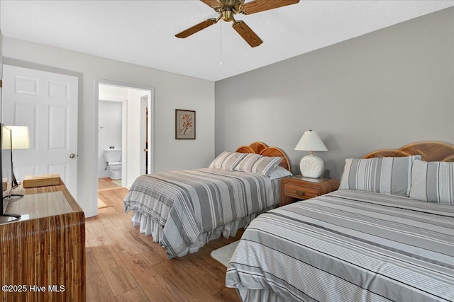 354 Sea Trail Dr E Unit 2, Sunset Beach, NC 28468 - bedroom with light wood-style flooring and ceiling fan