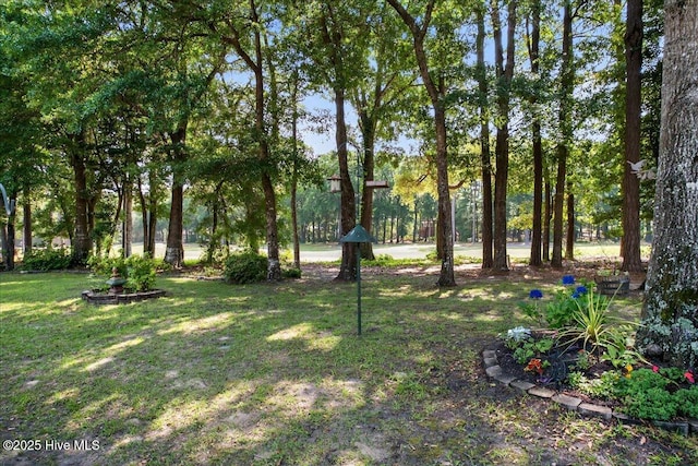 354 Sea Trail Dr E Unit 2, Sunset Beach, NC 28468 - view of green lawn
