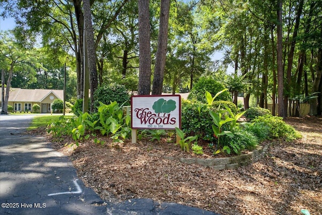 354 Sea Trail Dr E Unit 2, Sunset Beach, NC 28468 - community / neighborhood sign with view of wooded area