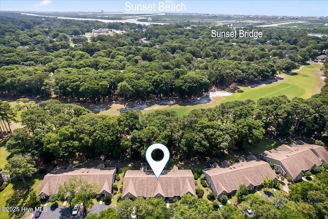 354 Sea Trail Dr E Unit 2, Sunset Beach, NC 28468 - aerial view of residential area featuring a heavily wooded area and a golf club