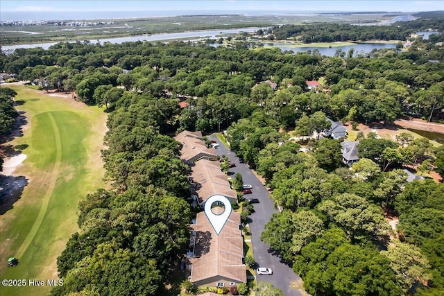 354 Sea Trail Dr E Unit 2, Sunset Beach, NC 28468 - aerial view of property and surrounding area with a nearby body of water, a local golf course, and a tree filled landscape