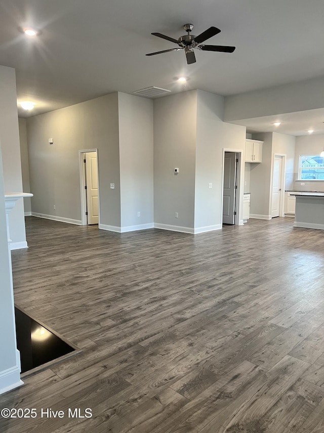 5046 Holly Hill Ct Lot 23, Battleboro, NC 27809 - unfurnished living room with dark wood finished floors, a ceiling fan, baseboards, and recessed lighting