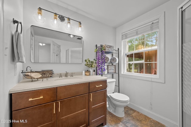 4967 E NC-24 Hwy, Beulaville, NC 28518 - full bathroom with vanity, toilet, baseboards, and a shower with door