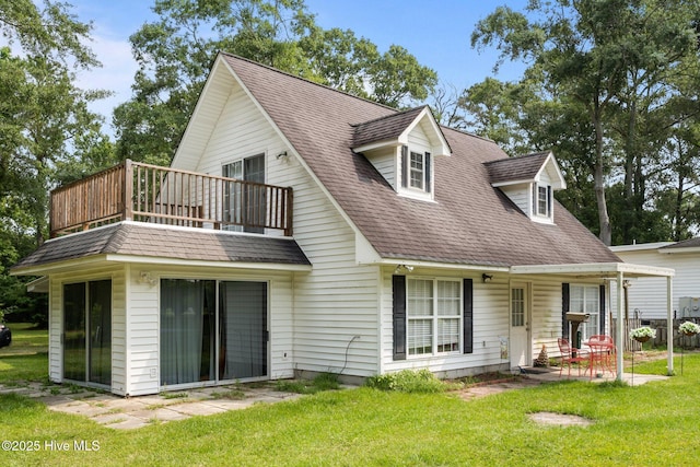 4967 E NC-24 Hwy, Beulaville, NC 28518 - view of front facade featuring a balcony, a front lawn, a patio, and a shingled roof