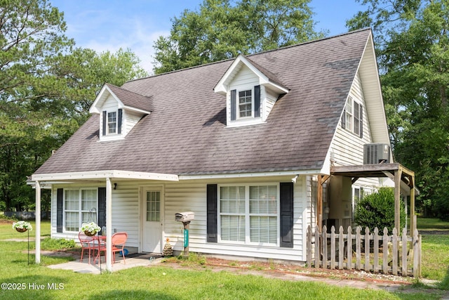 4967 E NC-24 Hwy, Beulaville, NC 28518 - cape cod house with a patio area, cooling unit, and a shingled roof