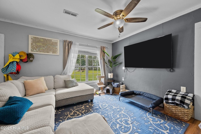 4967 E NC-24 Hwy, Beulaville, NC 28518 - living area with wood finished floors, ceiling fan, and ornamental molding