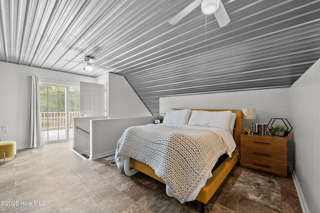 4967 E NC-24 Hwy, Beulaville, NC 28518 - bedroom with access to exterior, baseboards, vaulted ceiling, a ceiling fan, and stone finish flooring