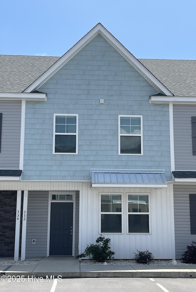 332 Starfish Ln, Sneads Ferry, NC 28460 - view of front of house featuring board and batten siding and roof with shingles