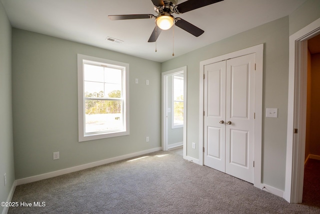 332 Starfish Ln, Sneads Ferry, NC 28460 - unfurnished bedroom with carpet flooring, a closet, and ceiling fan