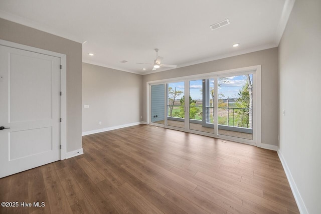 2593 Alvernia Dr, Castle Hayne, NC 28429 - spare room featuring baseboards, a ceiling fan, ornamental molding, wood finished floors, and recessed lighting