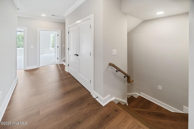 2593 Alvernia Dr, Castle Hayne, NC 28429 - corridor featuring baseboards, wood finished floors, recessed lighting, and an upstairs landing