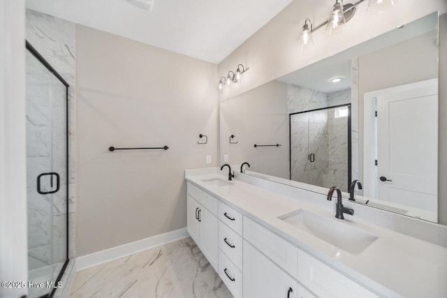 2593 Alvernia Dr, Castle Hayne, NC 28429 - bathroom featuring marble finish floors, baseboards, double vanity, and a marble finish shower