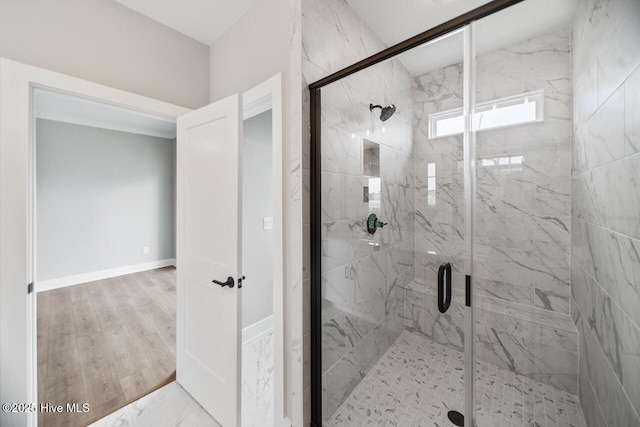 2593 Alvernia Dr, Castle Hayne, NC 28429 - bathroom featuring a marble finish shower and wood finished floors