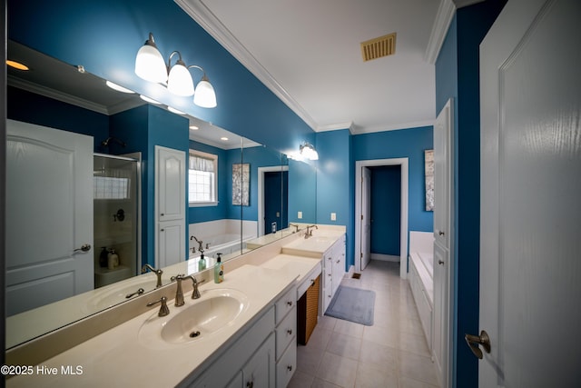 3804 Wyattwood Dr N, Wilson, NC 27896 - full bathroom featuring ornamental molding, a bath, a shower stall, double vanity, and tile patterned flooring