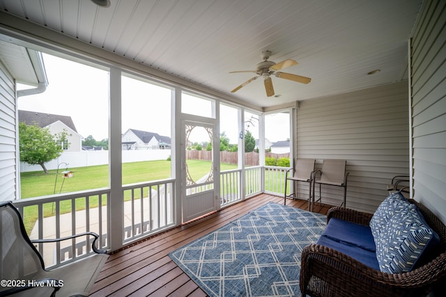 3804 Wyattwood Dr N, Wilson, NC 27896 - sunroom with a ceiling fan and a residential view