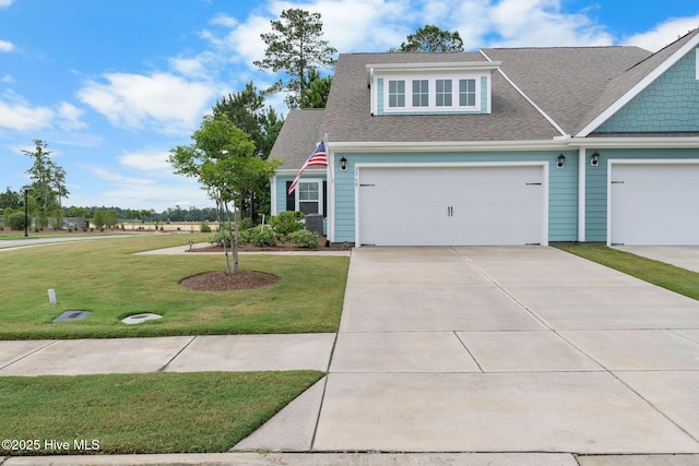 2968 Hatchers Run, Leland, NC 28451 - view of front of home with a front lawn, concrete driveway, a shingled roof, and an attached garage
