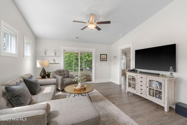 2968 Hatchers Run, Leland, NC 28451 - living room featuring vaulted ceiling, ceiling fan, wood finished floors, and baseboards