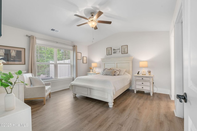 2968 Hatchers Run, Leland, NC 28451 - bedroom featuring lofted ceiling, wood finished floors, baseboards, and ceiling fan
