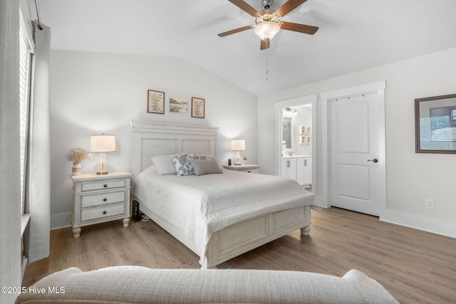 2968 Hatchers Run, Leland, NC 28451 - bedroom featuring vaulted ceiling, baseboards, wood finished floors, ensuite bathroom, and a ceiling fan
