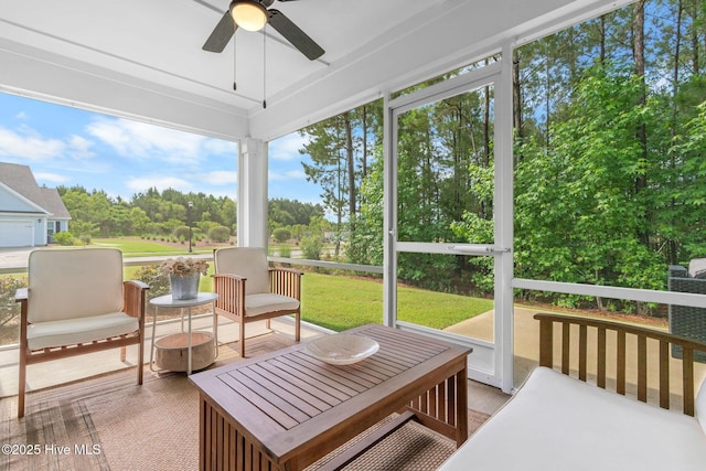 2968 Hatchers Run, Leland, NC 28451 - sunroom featuring ceiling fan and view of scattered trees