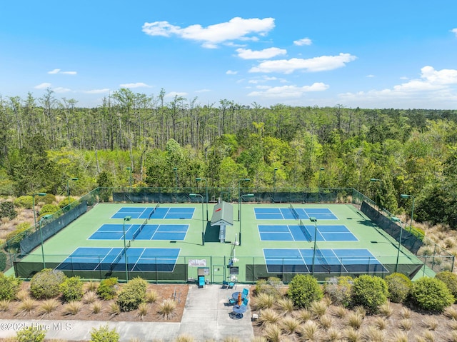 2968 Hatchers Run, Leland, NC 28451 - view of tennis court with a forest view
