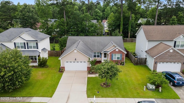 3106 John Willis Rd, New Bern, NC 28562 - view of front of home featuring concrete driveway, an attached garage, and brick siding