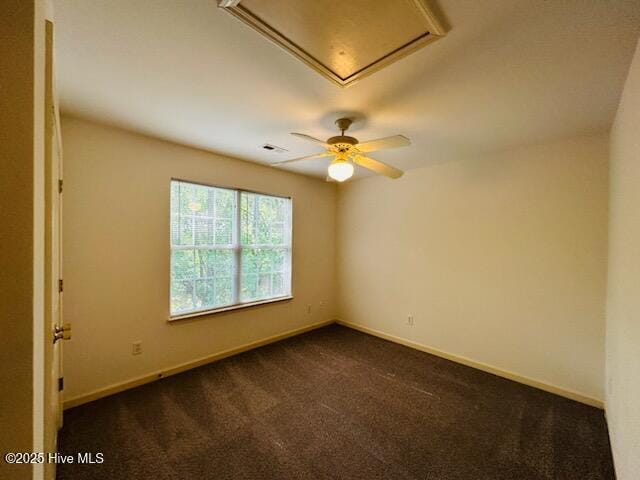 305 Saint Rosea Dr, Wilmington, NC 28405 - unfurnished room featuring dark carpet, baseboards, and ceiling fan