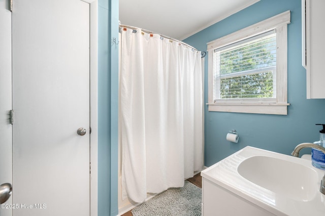 135 NE 34th St, Oak Island, NC 28465 - bathroom with a shower with curtain and vanity