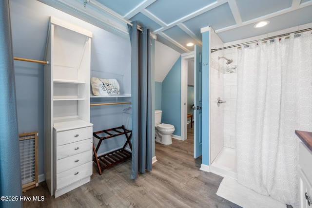 135 NE 34th St, Oak Island, NC 28465 - bathroom featuring a stall shower, wood finished floors, lofted ceiling, and recessed lighting