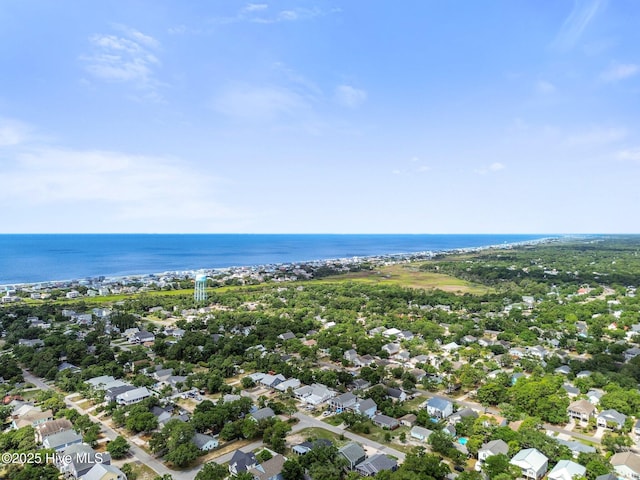 135 NE 34th St, Oak Island, NC 28465 - aerial view of residential area with a large body of water