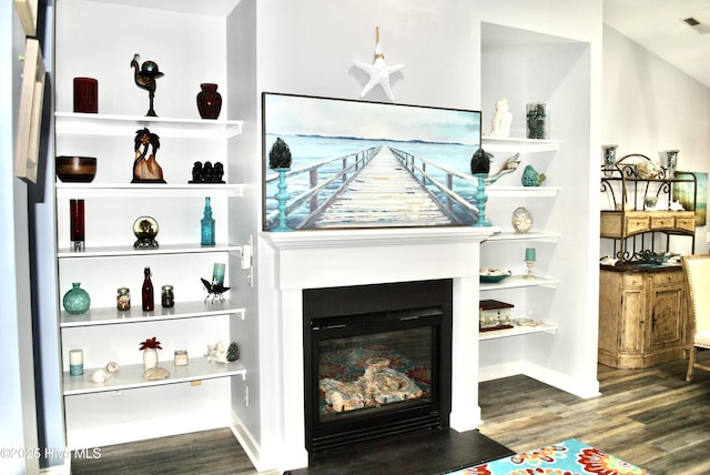 1335 Arbor Ridge Way, Leland, NC 28451 - detailed view of wood finished floors, a glass covered fireplace, and baseboards