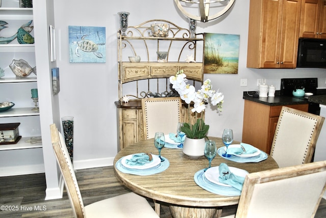 1335 Arbor Ridge Way, Leland, NC 28451 - dining area featuring dark wood-type flooring and baseboards