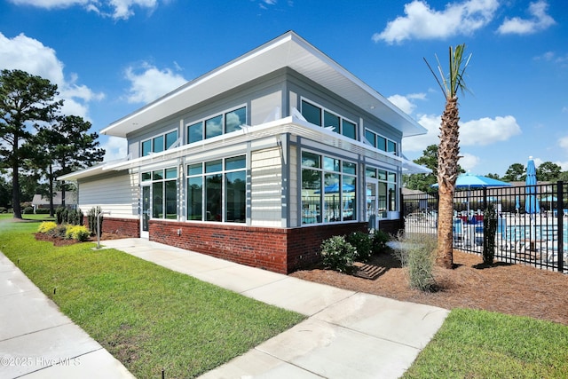 1335 Arbor Ridge Way, Leland, NC 28451 - view of property exterior featuring brick siding