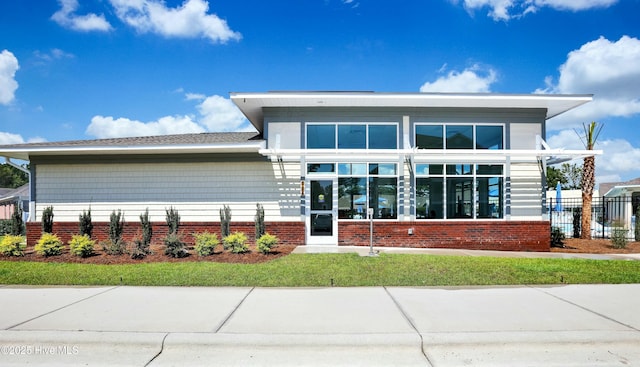 1335 Arbor Ridge Way, Leland, NC 28451 - back of property featuring brick siding