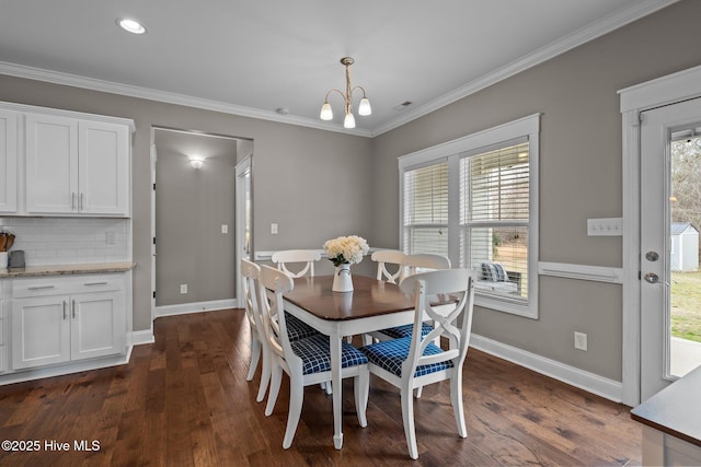 264 Bibey Rd, Carthage, NC 28327 - dining room featuring a chandelier, dark wood-type flooring, baseboards, and ornamental molding