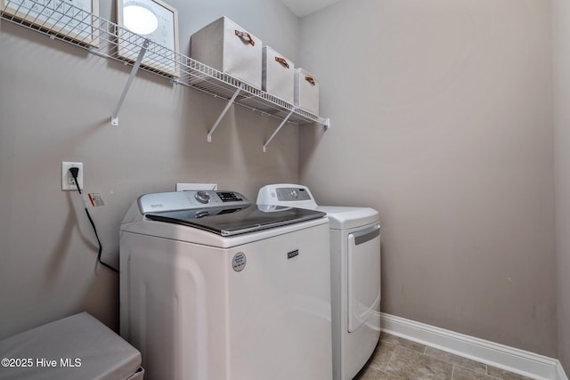 264 Bibey Rd, Carthage, NC 28327 - laundry area with baseboards and washing machine and clothes dryer