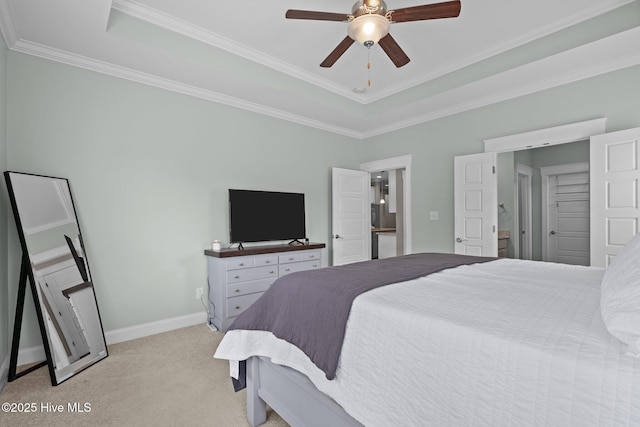 264 Bibey Rd, Carthage, NC 28327 - bedroom with light carpet, a tray ceiling, ornamental molding, baseboards, and ceiling fan