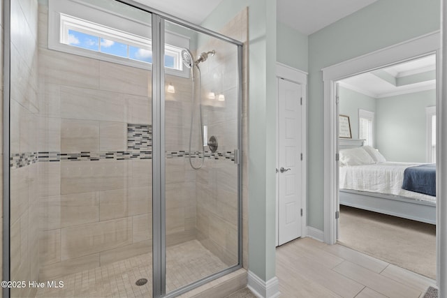 264 Bibey Rd, Carthage, NC 28327 - bathroom with ensuite bath, a stall shower, crown molding, and baseboards
