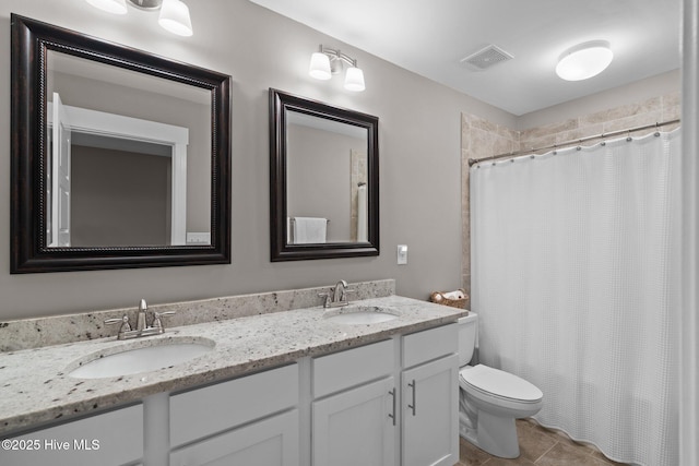 264 Bibey Rd, Carthage, NC 28327 - full bath with double vanity, toilet, curtained shower, and tile patterned flooring