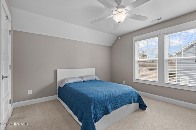 264 Bibey Rd, Carthage, NC 28327 - bedroom featuring light carpet, baseboards, lofted ceiling, and ceiling fan