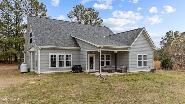 264 Bibey Rd, Carthage, NC 28327 - rear view of house with outdoor lounge area, a shingled roof, a patio area, and a yard
